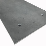 Close up of anchor-hole concrete wall paneling – FLOAT Concrete