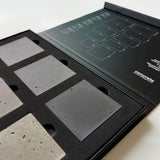 Sample pack of six concrete wall panels in natural-inspired colors, including greys and earthy tones