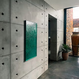 Hallway with concrete wall panels featuring four anchor holes – FLOAT Concrete