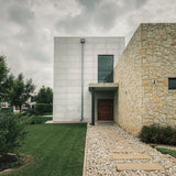Home entrance with decorative concrete wall panels – FLOAT Concrete