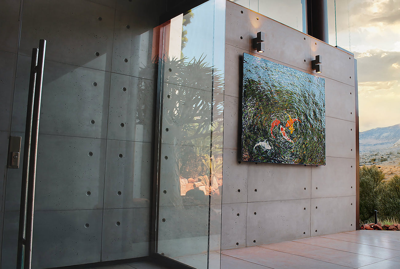 Wall concrete panels in United States at a modern luxury entrance with silica-free concrete wall panels, glass doors, and artistic koi fish painting, creating a contemporary architectural statement.