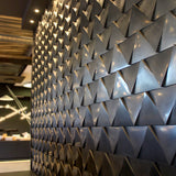 3D tiles for wall with geometric triangular pattern in a modern interior setting. - FLOAT concrete