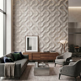 Modern living room with gray sofa, armchairs, and concrete 3d wall tiles. - FLOAT Concrete
