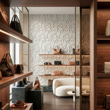 Modern interior design with shelves displaying bags and decor, geometric 3d wall tiles - FLOAT Concrete