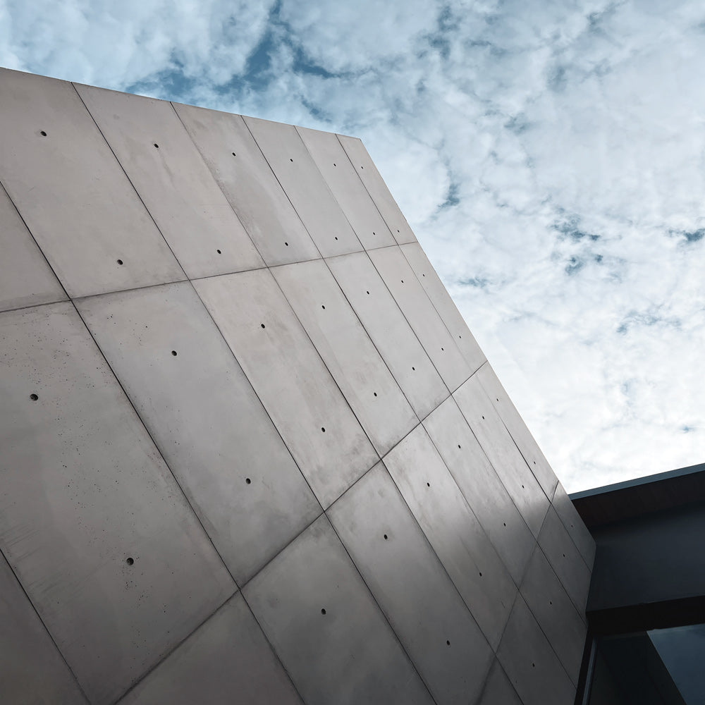 Exterior feature wall with concrete wall paneling – FLOAT Concrete