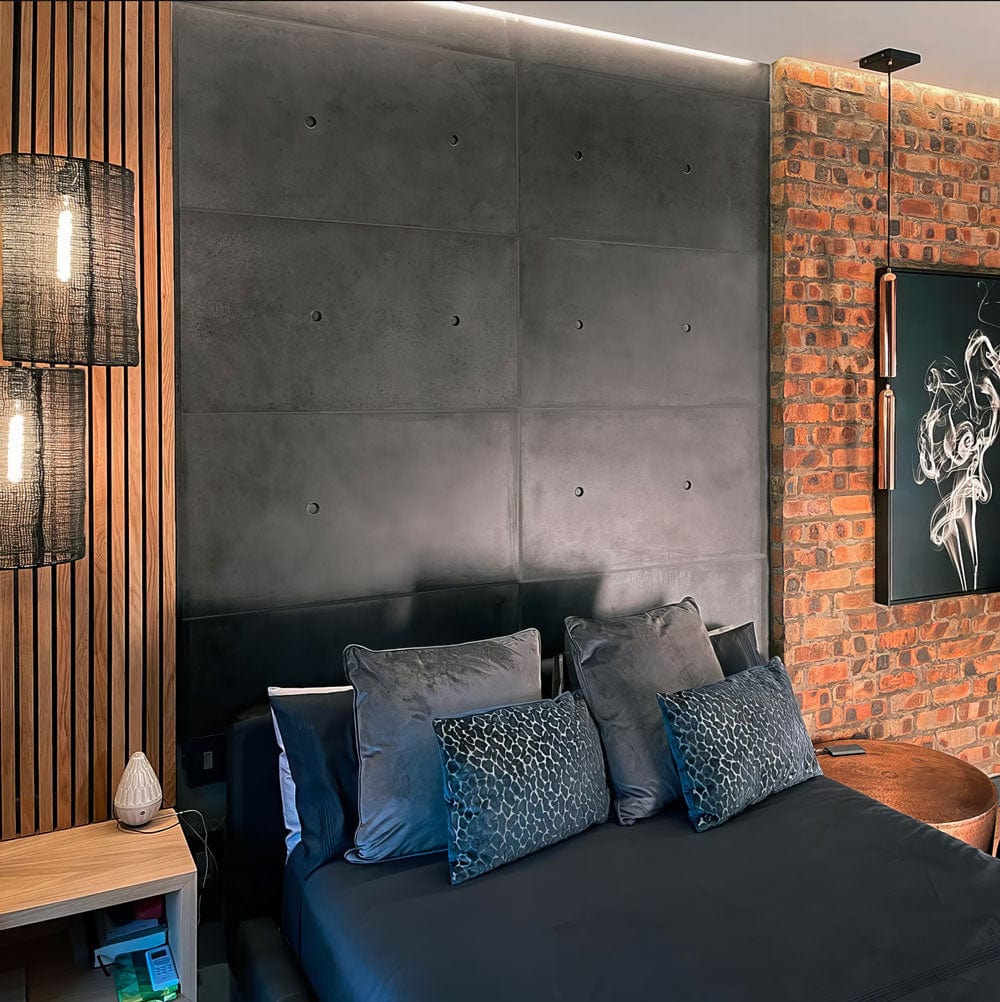 Dark concrete wall panels for a bold, modern look in bedrooms; adds sophistication and depth to your interior design