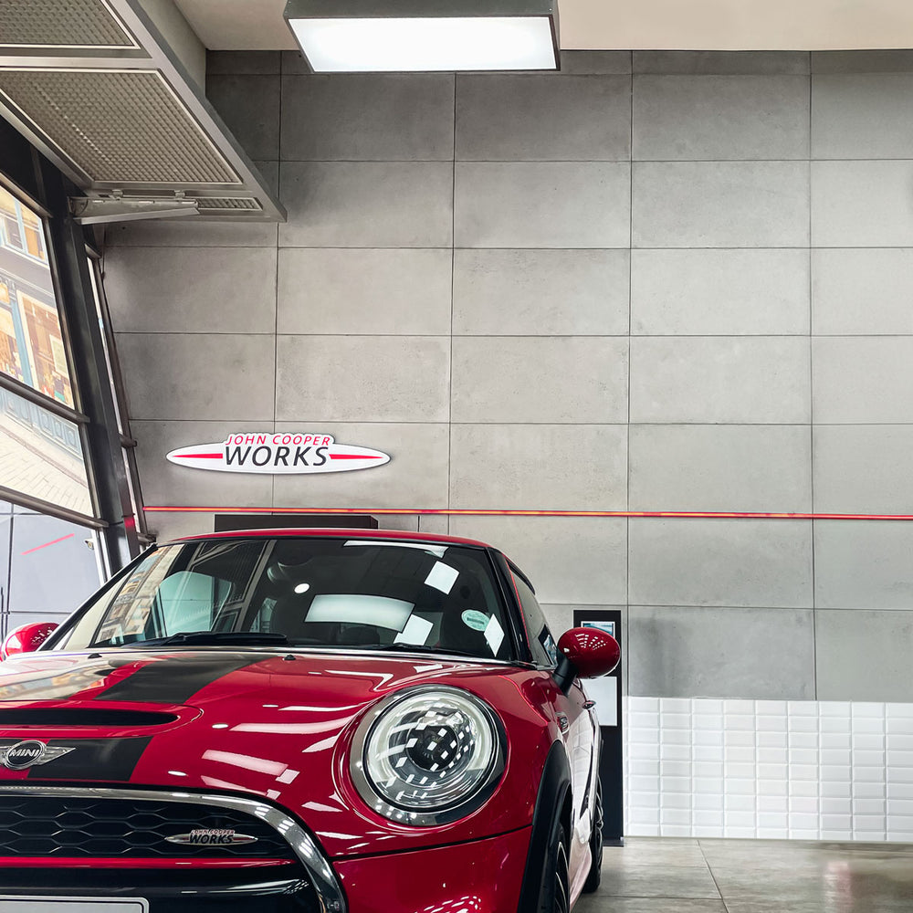 Commercial showroom interior with lightweight concrete panel wall – FLOAT Concrete