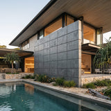 Modern house with a pool and outdoor seating area