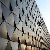 triangular-shaped concrete tiles for exterior walls in modern architectural design United States