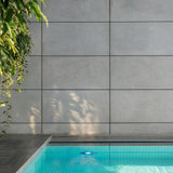 Concrete wall paneling feature wall in a modern spa pool interior with architectural concrete panels - FLOAT Concrete
