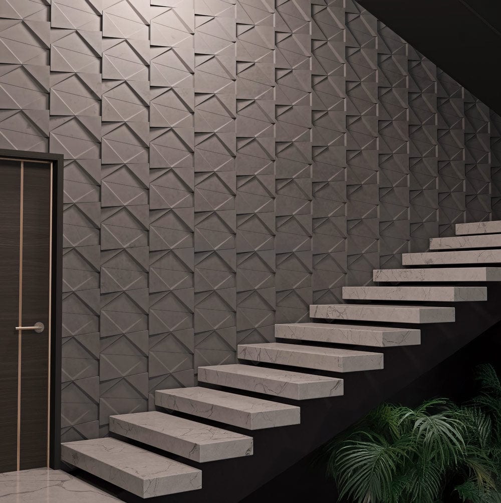 Fireproof panels with a 3D effect installed on staircase walls, offering safety and a dynamic visual impact