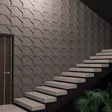 Fireproof panels with a 3D effect installed on staircase walls, offering safety and a dynamic visual impact