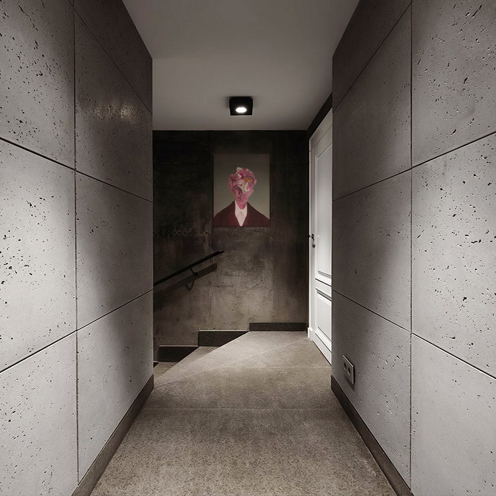 Hallway clad in textured concrete wall panels – FLOAT Concrete