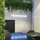 Reception area with modern concrete wall panels and greenery – FLOAT Concrete