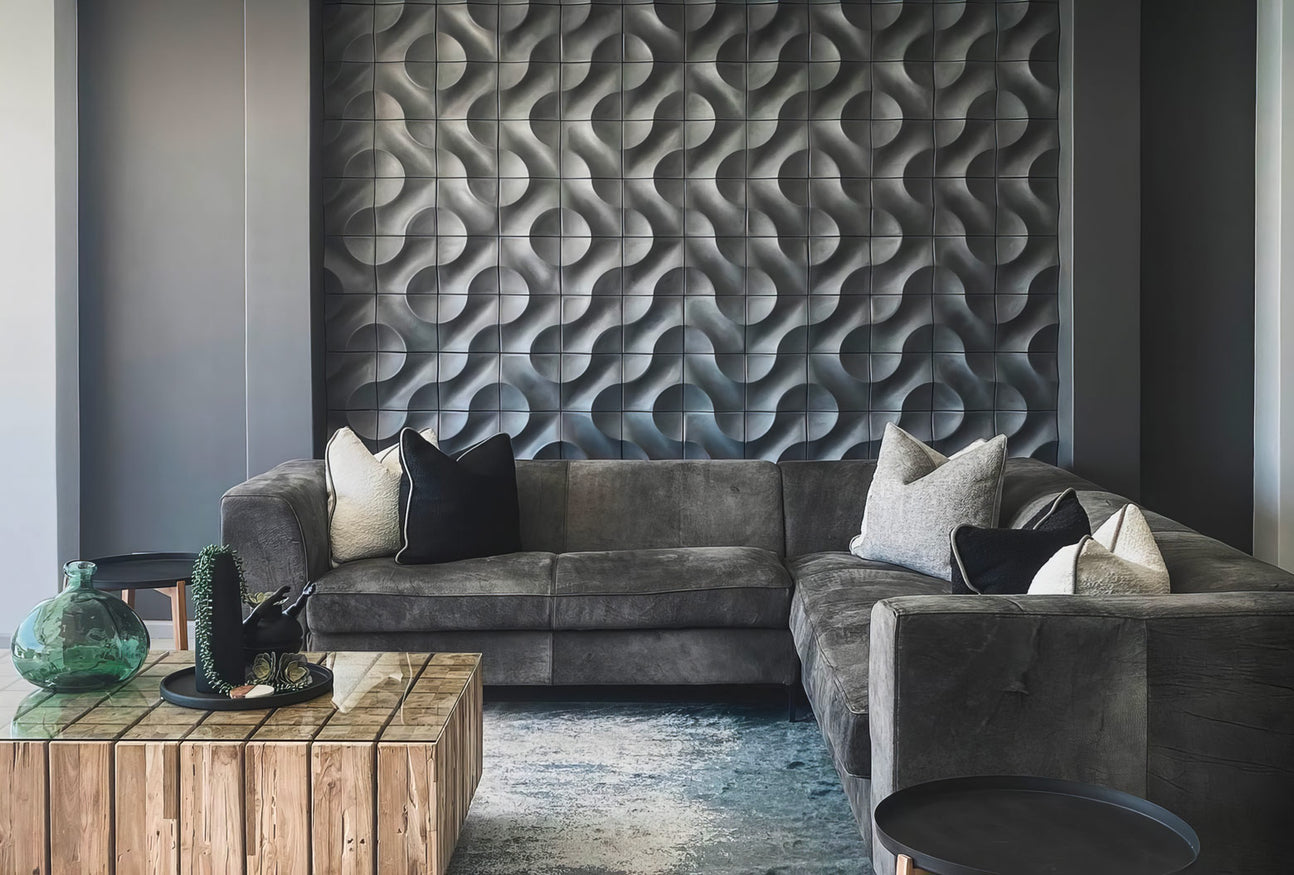 Architectural 3D wall tiles enhancing light and surface texture in living room